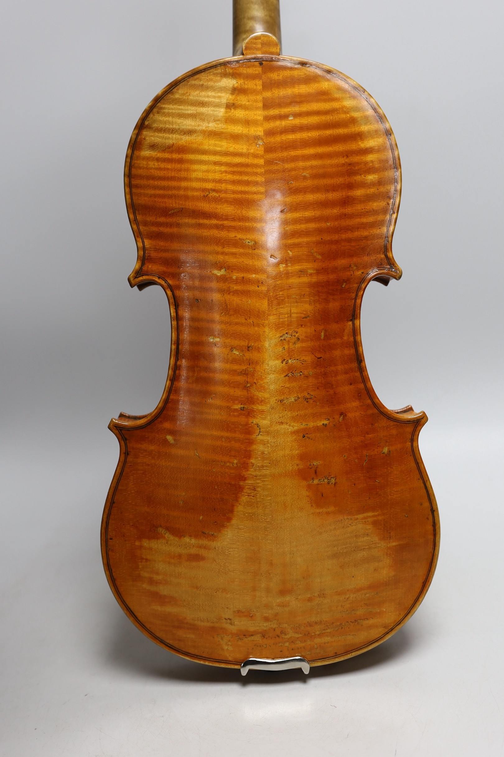 A cased violin, sound post loose